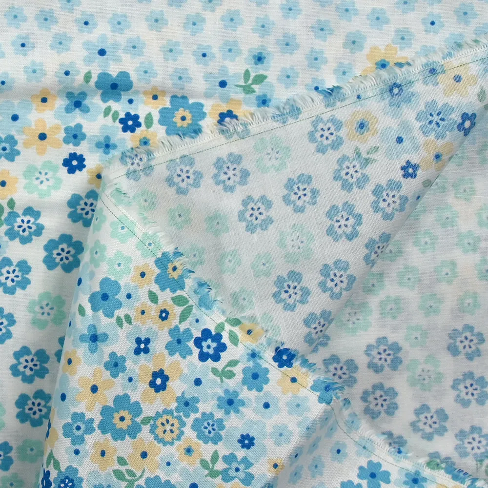 Coton imprimé fleurs Adèle bleu fond blanc