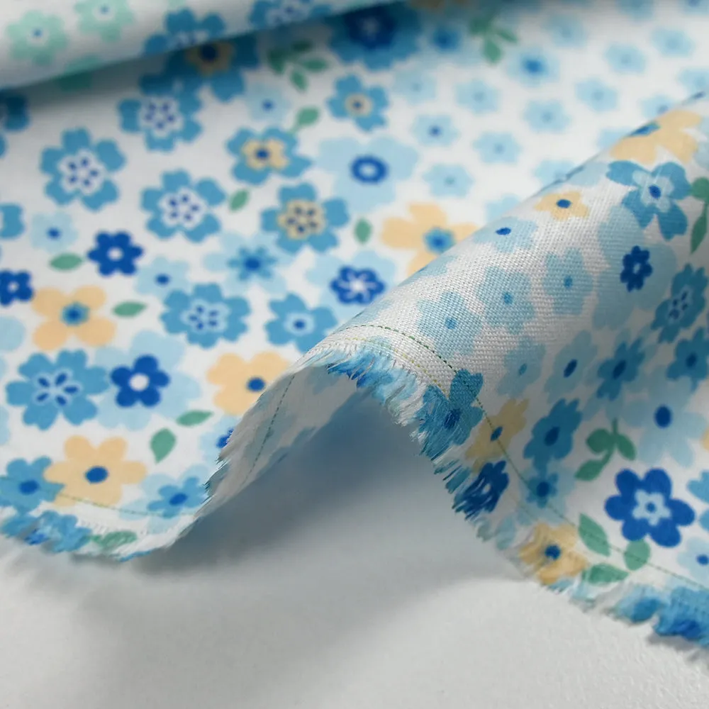 Coton imprimé fleurs Adèle bleu fond blanc