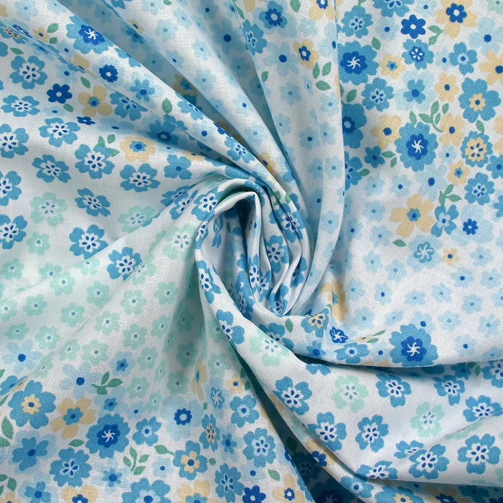 Coton imprimé fleurs Adèle bleu fond blanc