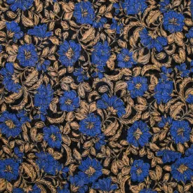 Mousseline imprimée plumetis lurex fleurs bleues et beige fond noir