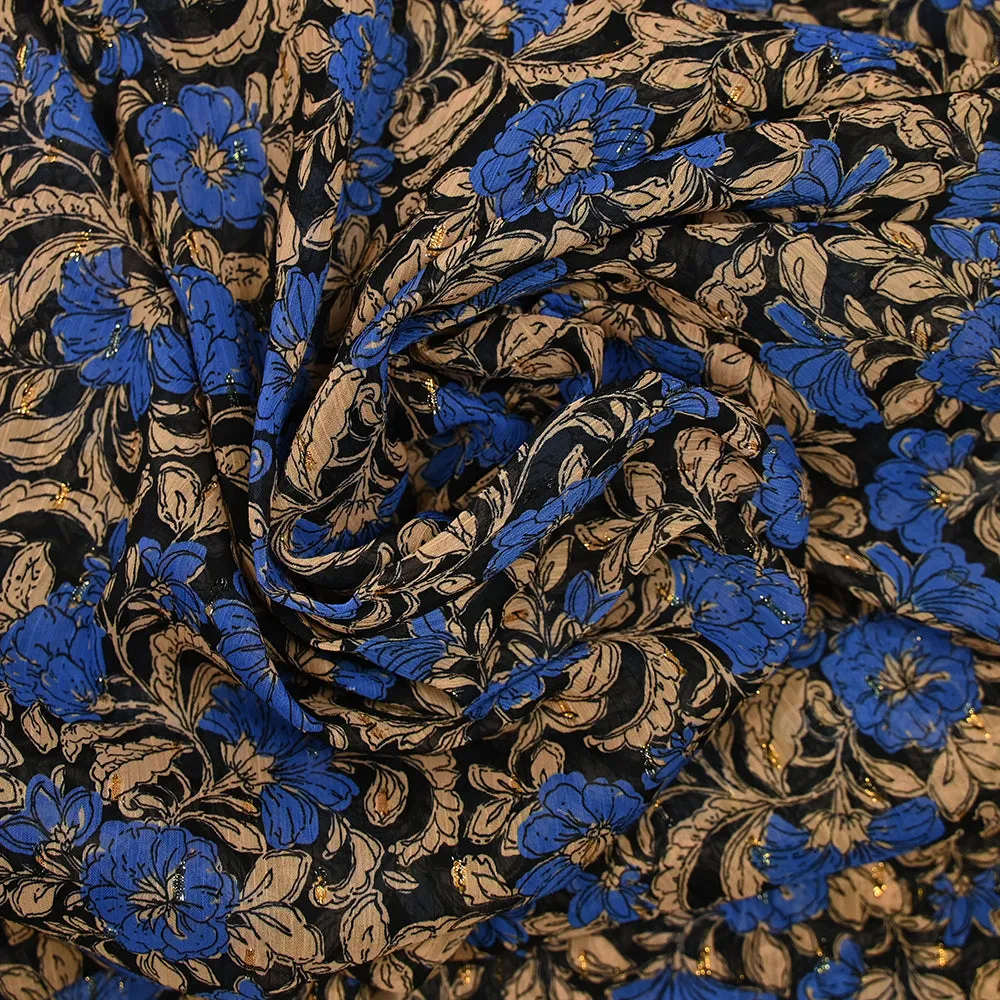 Mousseline imprimée plumetis lurex fleurs bleues et beige fond noir